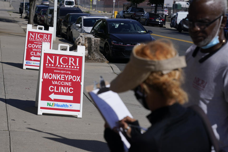 FILE - People line up to receive the monkeypox vaccine at a walk-in clinic at the North Jersey Community Research Initiative in Newark, N.J., on Aug. 16, 2022. With monkeypox cases subsiding in Europe and parts of North America, many scientists say now is the time to prioritize stopping the virus in Africa. (AP Photo/Seth Wenig, File)