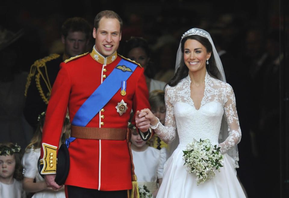 Prince William, left, and Catherine, Duchess of Cambridge, are seen walking after their wedding ceremony in Westminster Abbey in central London in this April 29, 2011 file photograph.