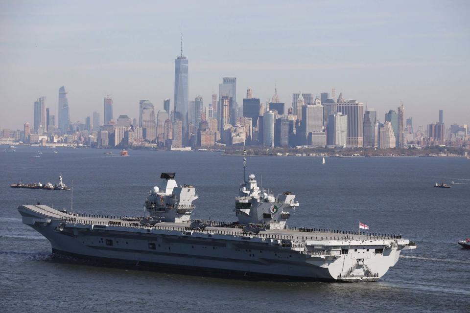 HMS Queen Elizabeth aircraft carrier is preparing for its first operational deployment in 2021 (PA)