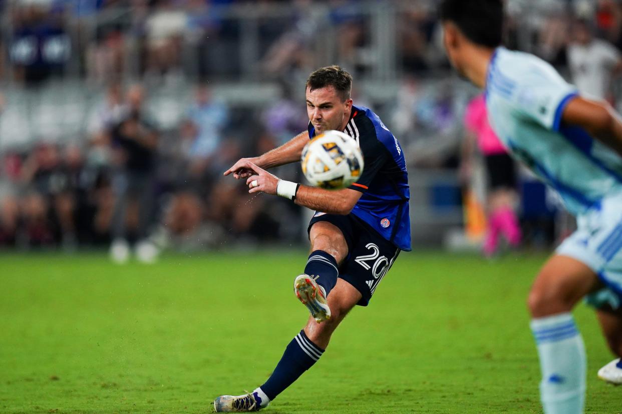 FC Cincinnati midfielder Pavel Bucha (20) kicks the ball in an effort to score a goal during the second half of a MLS game between FC Cincinnati and CF Montréal, Saturday, Aug. 31, 2024, at TQL Stadium in Cincinnati. FC Cincinnati won 4-1.