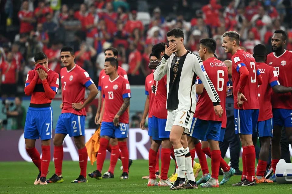 Germany&#39;s midfielder #07 Kai Havertz (C) stands along with Costa Rica&#39;s players at the end of the Qatar 2022 World Cup Group E football match between Costa Rica and Germany at the Al-Bayt Stadium in Al Khor, north of Doha on December 1, 2022. (Photo by Ina Fassbender / AFP) (Photo by INA FASSBENDER/AFP via Getty Images)