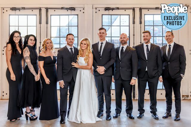 <p>Ben Wagner Photography</p> Cristy Lee and John Hawkins pose with their wedding party