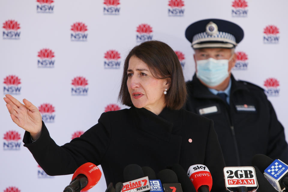 SYDNEY, AUSTRALIA - JULY 07: Premier Gladys Berejiklian takes questions during a COVID-19 update and press conference on July 07, 2021 in Sydney, Australia. Lockdown restrictions have been extended by another week across Greater Sydney, the Blue Mountains, the Central Coast and Wollongong as NSW health authorities work to contain a growing COVID-19 cluster. Restrictions will remain in place until midnight on Friday 16 July. All residents in areas subject to stay-at-home orders are only permitted to leave their homes for essential reasons, including purchasing essential goods, accessing or providing care/healthcare, work, education and exercise. Students in greater Sydney will not return to face-to-face classes when holidays end next Tuesday and will begin the new term with online classes. Regional schools will reopen for face-to-face learning as planned on 13 July for term three. (Photo by Lisa Maree Williams/Getty Images)