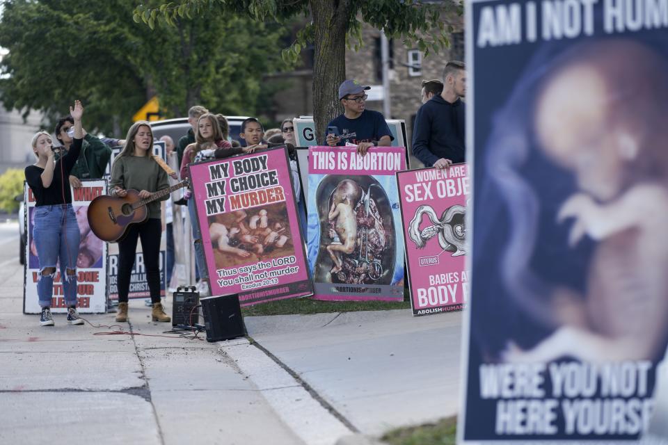 Protesters are seen outside Planned Parenthood, Monday, Sept. 18, 2023, in Milwaukee. (AP Photo/Morry Gash)