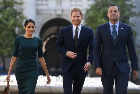 Britain's Prince Harry and his wife Meghan, the Duke and Duchess of Sussex, are greeted by the Taoiseach Leo Varadkar, as they arrive for a two-day visit to Dublin, Ireland July 10, 2018. REUTERS/Clodagh Kilcoyne