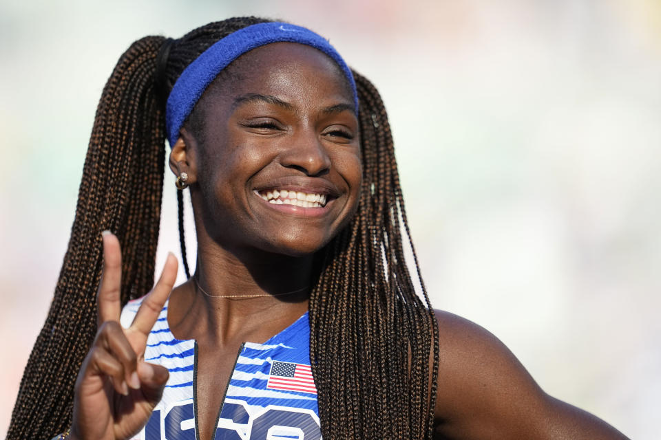 Twanisha Terry, of the United States, wins a heat during the women's 4x100-meter relay at the World Athletics Championships on Friday, July 22, 2022, in Eugene, Ore. (AP Photo/Ashley Landis)