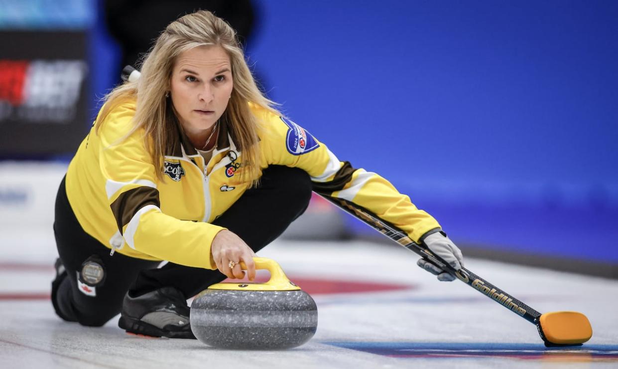 Manitoba skip Jennifer Jones makes a shot during a semifinal game against Manitoba's Kate Cameron at the Scotties Tournament of Hearts in Calgary on Sunday. (Jeff McIntosh/The Canadian Press - image credit)
