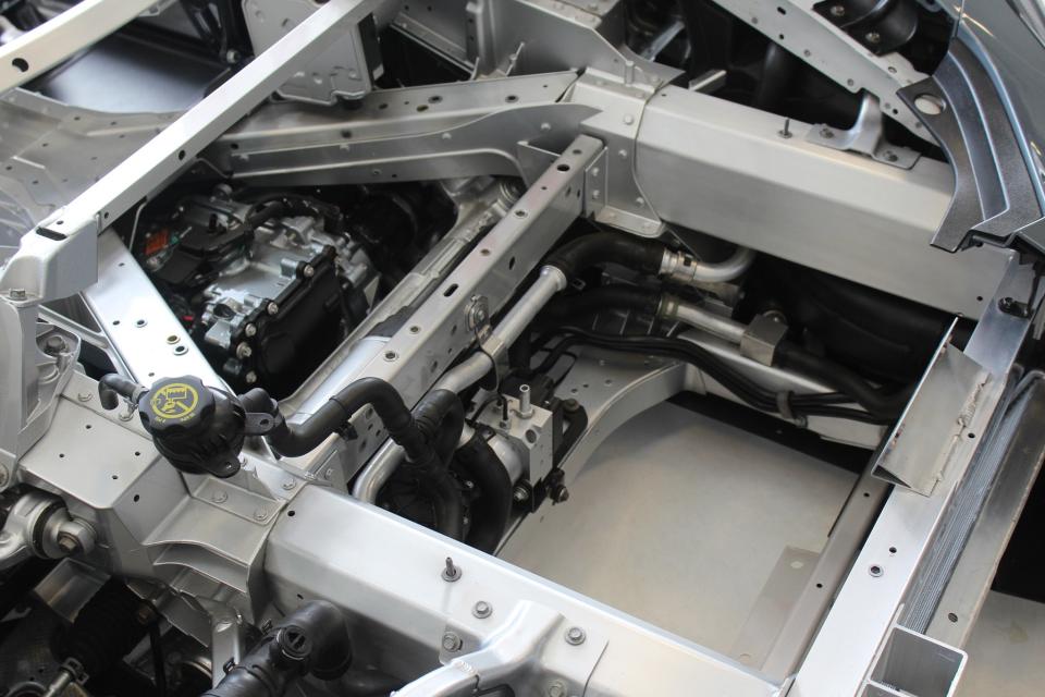 The front drive unit inside the Corvette E-Ray's nose.