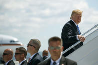 <p>President Donald Trump boards Air Force One for a trip to Singapore to meet with North Korean leader Kim Jong Un, Saturday, June 9, 2018, at Canadian Forces Base Bagotville, in Canada. (Photo: Evan Vucci/AP) </p>