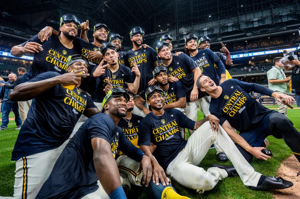 Milwaukee Brewers players celebrate their NL Central title.