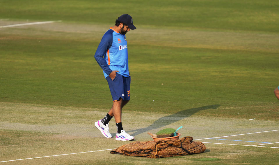 Indian cricket captain Rohit Sharma inspects the pitch before their third one day international cricket match against New Zealand in Indore, India, Monday, Jan. 23, 2023. (AP Photo/Rajanish Kakade)