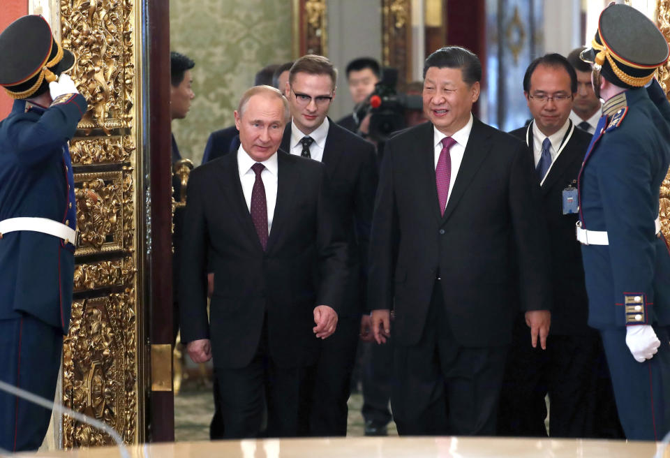 Russian President Vladimir Putin, centre left, and Chinese President Xi Jinping during their meeting in the Kremlin in Moscow, Russia, Wednesday, June 5, 2019. Chinese President Xi Jinping is on visit to Russia this week and is expected to attend Russia's main economic conference in St. Petersburg. (Maxim Shipenkov/Pool Photo via AP)