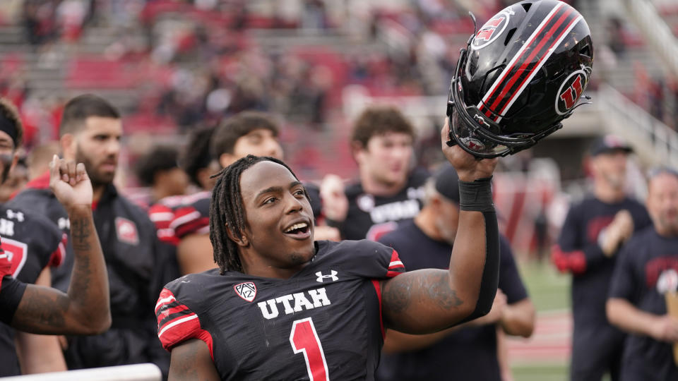 Utah running back Jaylon Glover (1) celebrates with his team following their NCAA college football game against Arizona State Saturday, Nov. 4, 2023, in Salt Lake City. (AP Photo/Rick Bowmer)