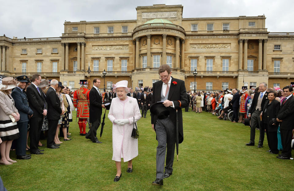 File photo dated 22/05/13 of Queen Elizabeth II alongside the Lord Chamberlain, the Earl Peel, who has delayed his retirement because of the coronavirus pandemic.