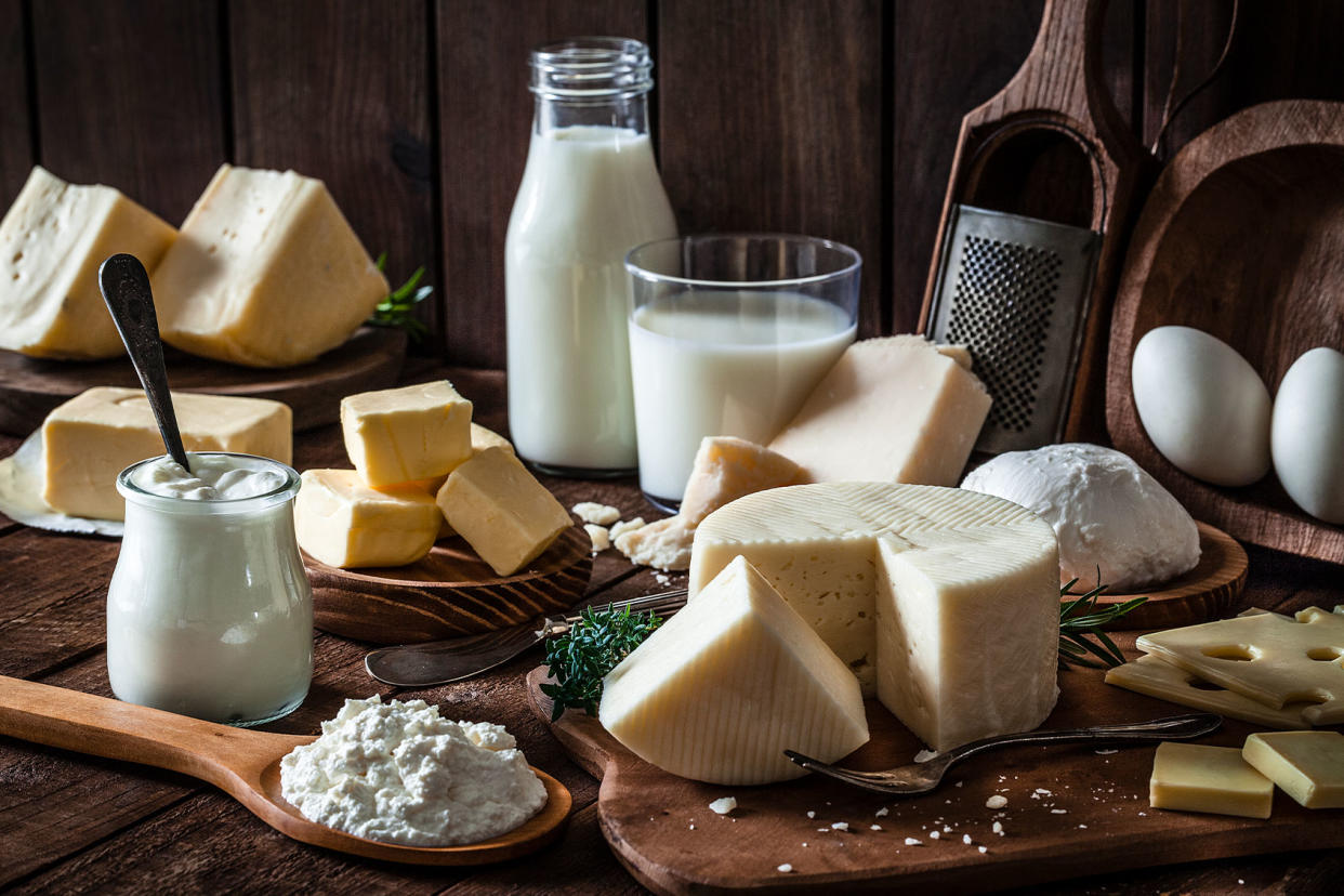 Dairy products assortment shot on rustic wooden table. Getty Images/fcafotodigital