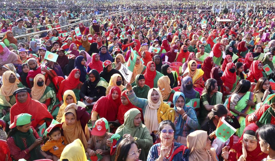 Supporters of the ruling Awami League party gather for an election campaign rally by Bangladesh's Prime Minister Sheikh Hasina, ahead of the upcoming national elections, in Sylhet, Bangladesh, Wednesday, Dec. 20, 2023. The country is gearing up for the Jan. 7 election, but opposition Bangladesh Nationalist Party led by former Prime Minister Khaleda Zia repeated its call on Wednesday to boycott the election. (AP Photo/Saiful Islam Kallal)