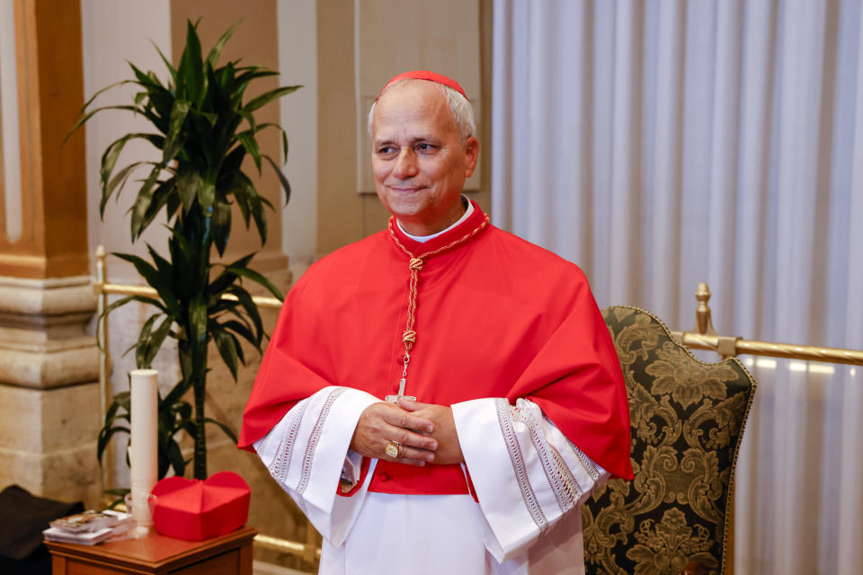 New Cardinal Robert Francis Prevost, Prefect of the Dicastery for Bishops, poses for a photo at the end of the consistory where Pope Francis elevated 21 new cardinals in St. Peter's Square at The Vatican, Saturday, Sept. 30, 2023. (AP Photo/Riccardo De Luca)