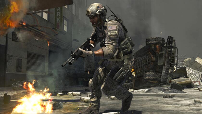 A CGI person in a military uniform wielding a gun while running through wreckage in a still from a video game