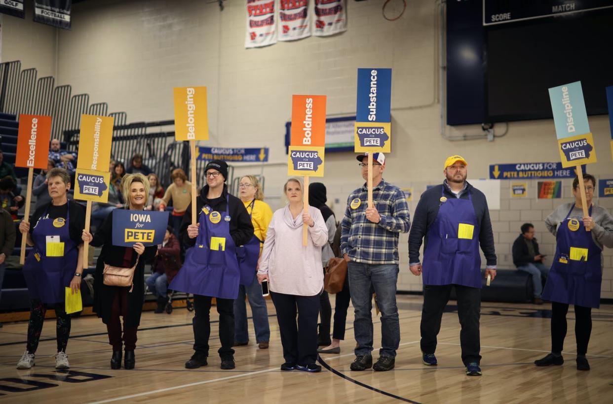 <span class="caption">Supporters of Democratic presidential candidate Pete Buttigieg prepare to caucus for him in a high school gym, Feb. 3, 2020, in Des Moines, Iowa. </span> <span class="attribution"><a class="link " href="https://www.gettyimages.com/detail/news-photo/supporters-of-democratic-presidential-candidate-democratic-news-photo/1203889098?adppopup=true" rel="nofollow noopener" target="_blank" data-ylk="slk:Chip Somodevilla/Getty Images;elm:context_link;itc:0;sec:content-canvas">Chip Somodevilla/Getty Images</a></span>