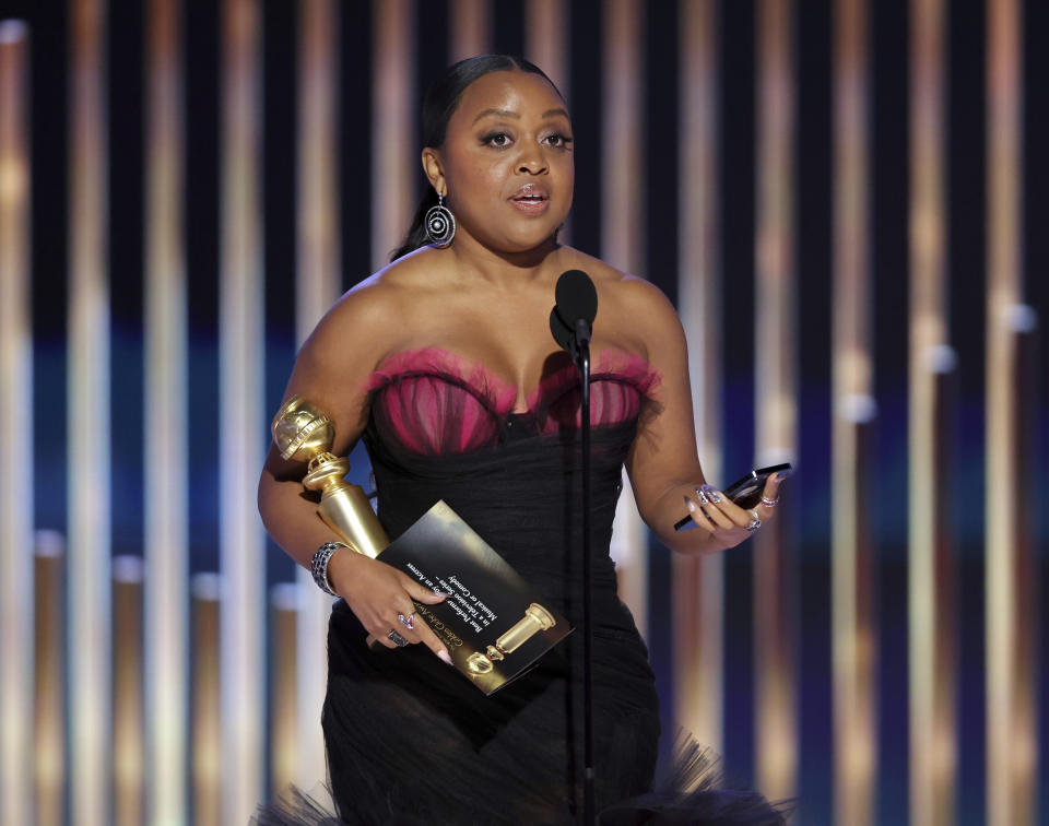 This image released by NBC shows Quinta Brunson accepting the Best Actress in a Television Series – Musical or Comedy award for "Abbott Elementary" during the 80th Annual Golden Globe Awards at the Beverly Hilton Hotel on Tuesday, Jan. 10, 2023, in Beverly Hills, Calif. (Rich Polk/NBC via AP)