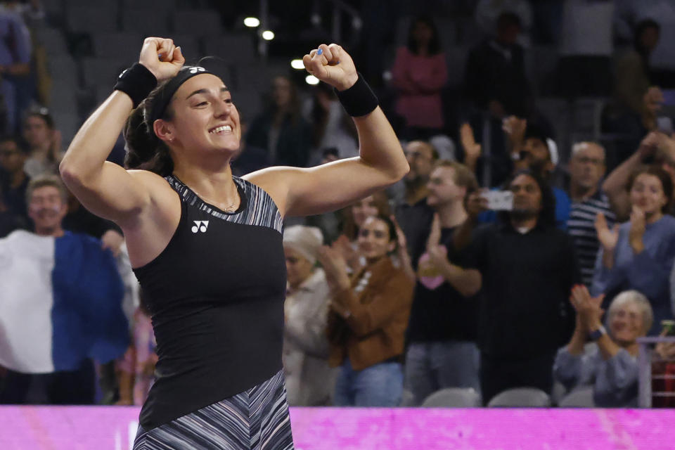 Caroline Garcia, of France, celebrates after defeating Aryna Sabalenka, of Belarus, in the singles final at the WTA Finals tennis tournament in Fort Worth, Texas, Monday, Nov. 7, 2022. (AP Photo/Ron Jenkins)