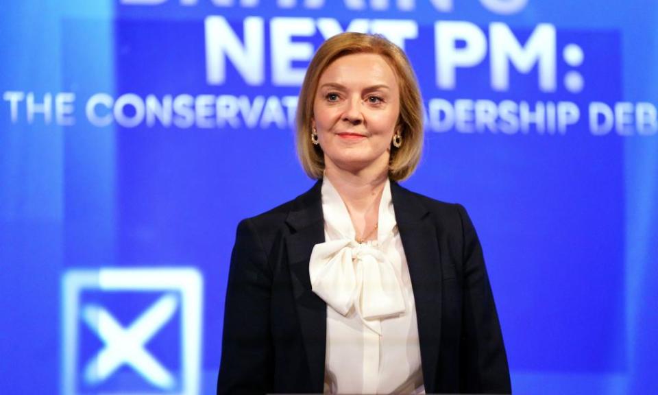 Liz Truss in a Margaret Thatcher-inspired pussybow blouse.