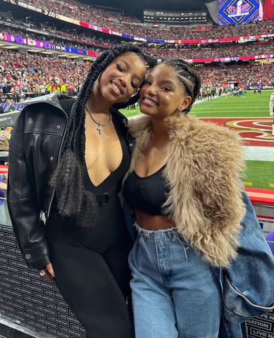 <p>Halle Bailey/Instagram</p> Chloe and Halle Bailey pose at the 2024 Super Bowl.