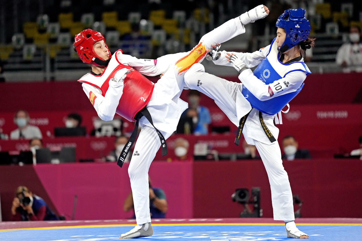 Jul 24, 2021; Chiba, Japan; Panipak Wongpattanakit (THA) fights Adriana Cerezo Iglesias (ESP) in the in the women's -49 gold medal match during the Tokyo 2020 Olympic Summer Games at Makuhari Messe Hall A. Mandatory Credit: James Lang-USA TODAY Network