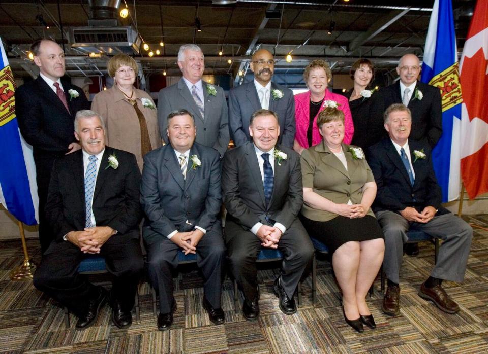 Bill Estabrooks, bottom right, served as part of the only NDP government in Nova Scotia's history, under former premier Darrell Dexter.