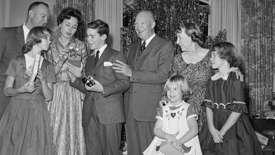 <strong>1960:</strong> The Eisenhower family on Christmas Eve. Mamie Eisenhower (second from right) was the first first lady to expand holiday decorations at the White House. - Henry Griffin/AP