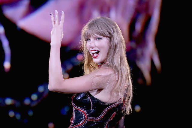 <p>John Shearer/TAS23/Getty</p> Taylor Swift performing at the Eras Tour in Kansas City, Missouri on July 7, 2023