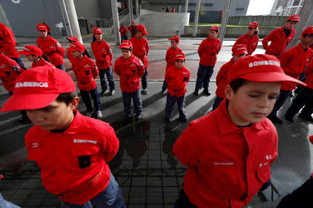 Members of firefighter school attend a training session in Oliveira do Hospital, Portugal November 10, 2018. Picture taken November 10, 2018. REUTERS/Rafael Marchante