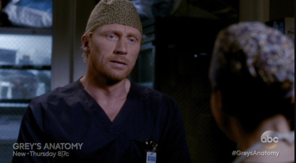 Owen in blue scrubs in "Grey's Anatomy"