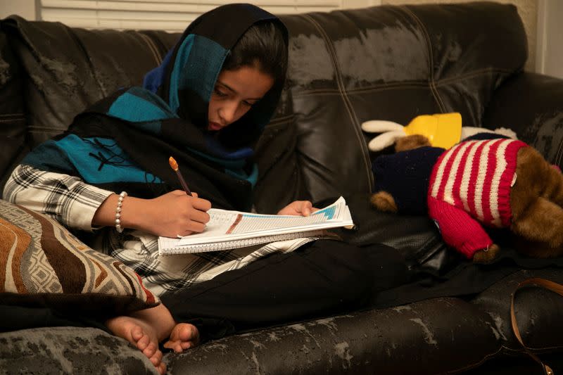 The Wider Image: From Kabul to Kentucky: Afghans put down roots in refugee haven