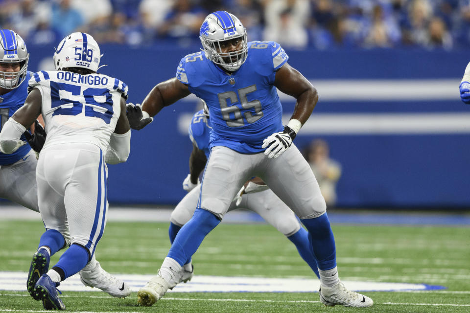 FILE - Detroit Lions tackle Obinna Eze (65) drops into pass protection during an NFL football game against the Indianapolis Colts, Saturday, Aug. 20, 2022, in Indianapolis. Born in Nigeria, Eze has not seen his parents in seven years. (AP Photo/Zach Bolinger, File)