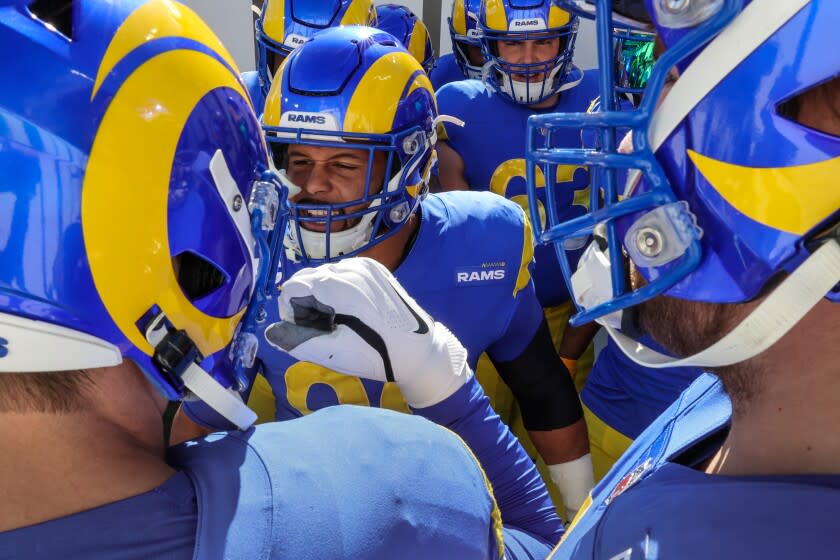 Tampa, Florida, Sunday, January 23, 2022 - Los Angeles Rams defensive end Aaron Donald (99) rallies teammates.