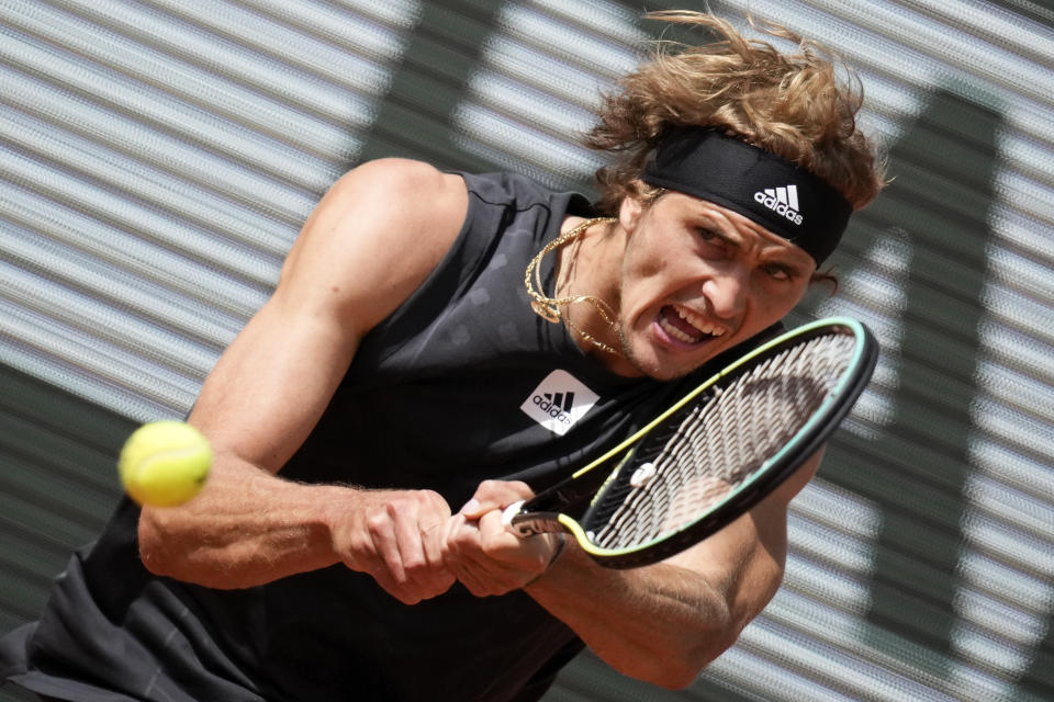 Germany's Alexander Zverev plays a shot against Argentina's Sebastian Baez during their second round match at the French Open tennis tournament in Roland Garros stadium in Paris, France, Wednesday, May 25, 2022. (AP Photo/Christophe Ena)