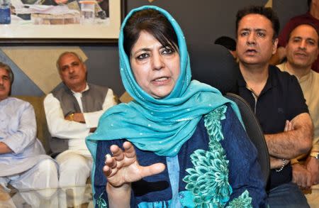 Former Jammu and Kashmir Chief Minister Mehbooba Mufti gestures as she addresses a news conference in Srinagar, June 19, 2018. REUTERS/Yawar Nazir Kabli