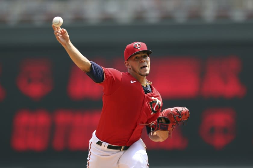 Minnesota Twins' pitcher Jose Berrios throws against the Detroit Tigers during the first inning of a baseball game, Sunday, July 11, 2021, in Minneapolis. (AP Photo/Stacy Bengs)