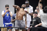 Denver Nuggets forward Jeff Green, left, and head coach Michael Malone celebrate during a rally and parade to mark the team's first NBA basketball championship on Thursday, June 15, 2023, in Denver. (AP Photo/David Zalubowski)