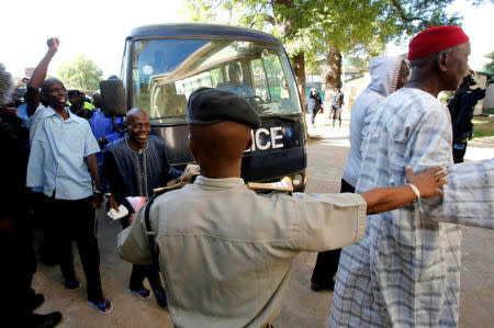 Gambian political prisoners arrive at the Supreme Court for trial in Banjul, Gambia December 5, 2016. REUTERS/Thierry Gouegnon