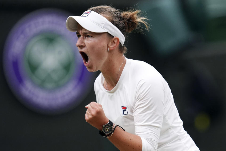 Barbora Krejcikova of the Czech Republic reacts during a fourth round match against to Danielle Collins of the United States at the Wimbledon tennis championships in London, Monday, July 8, 2024. (John Walton/PA via AP)