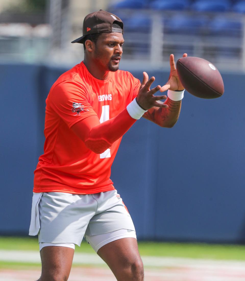 Cleveland Browns quarterback Deshaun Watson takes a snap during minicamp on Wednesday, June 15, 2022 in Canton, Ohio, at Tom Benson Hall of Fame Stadium.