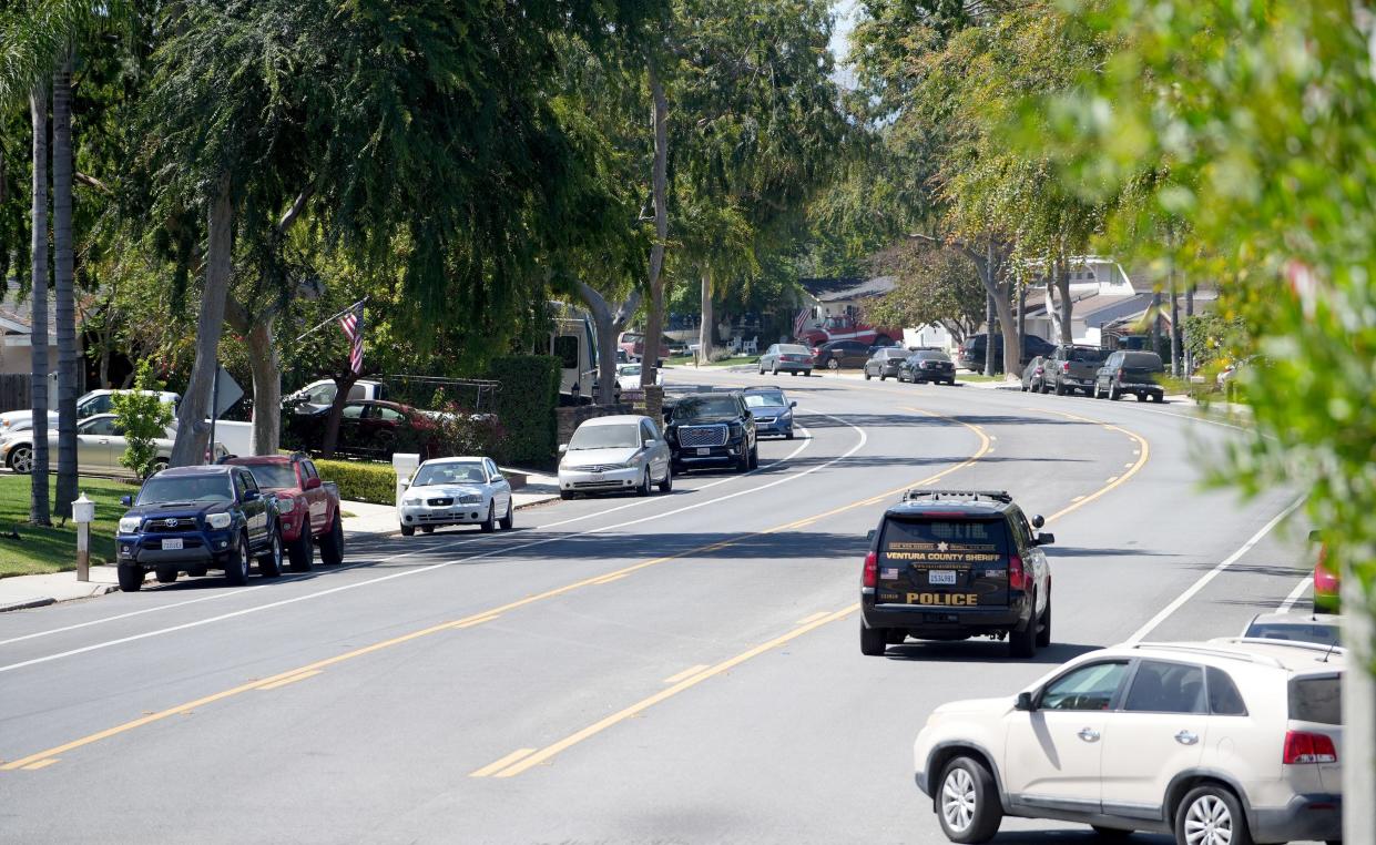 A Ventura County Sheriff’s vehicle is seen on Avenida de Las Plantas in Thousands Oaks Friday as the agency continues to investigate a fatal shooting Wednesday night involving two 80-year-old roommates.