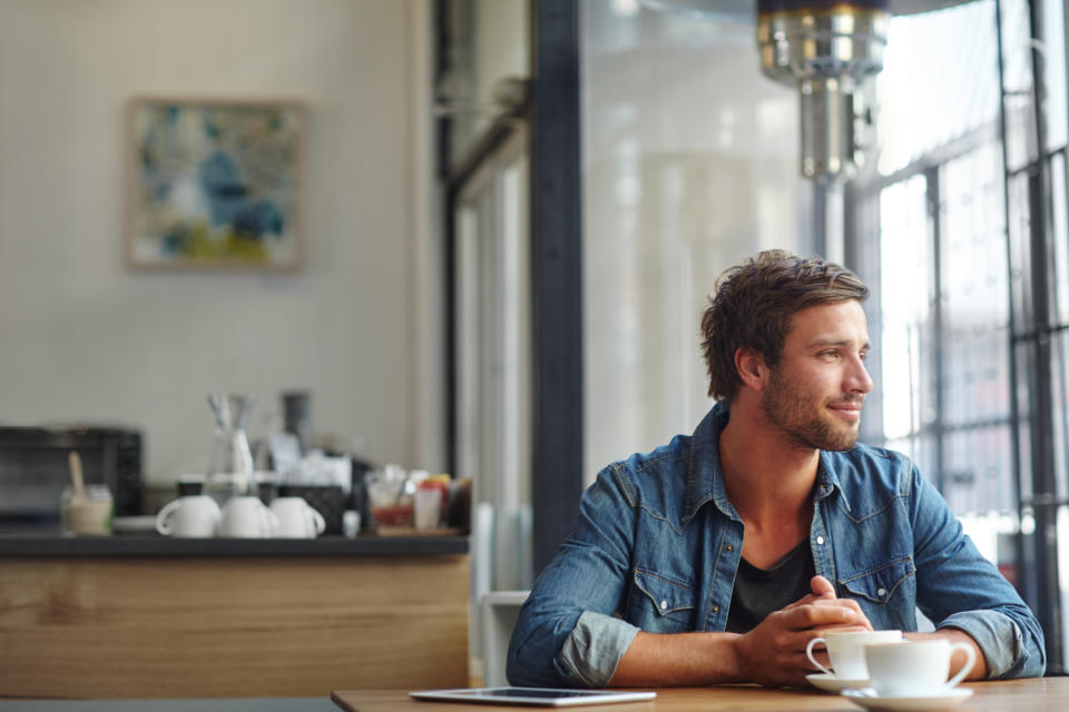 A man sitting in a coffee shop