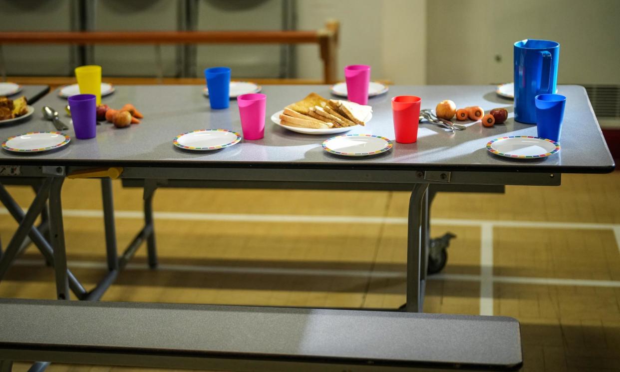 <span>Food is laid out for pupils at a breakfast club. In deprived areas, schools are picking up the pieces as a growing number of parents struggle to feed their children properly.</span><span>Photograph: Christopher Furlong/Getty Images</span>