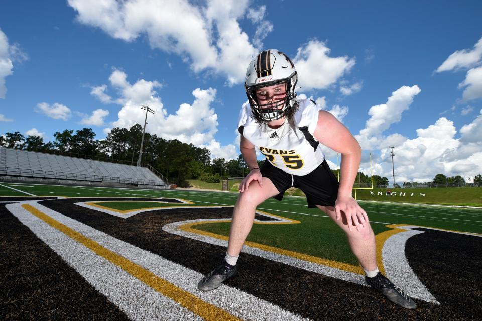 Evans’ Mason Short poses for a portrait on the school’s football field on Monday, July 18, 2022. 