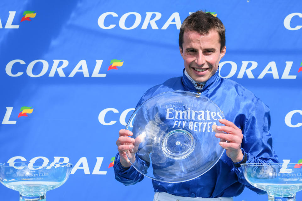 ESHER, ENGLAND - JULY 05: Ghaiyyath and William Buick are presented the trophy after winning 
The Coral Eclipse at Sandown Park Racecourse on July 05, 2020 in Esher, England. (Photo by Megan Ridgwell/Pool via Getty Images)