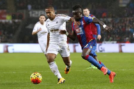 Football - Swansea City v Crystal Palace - Barclays Premier League - Liberty Stadium - 6/2/16 Crystal Palace's Papa Soure and Swansea's Wayne Routledge Mandatory Credit: Action Images / Paul Childs Livepic
