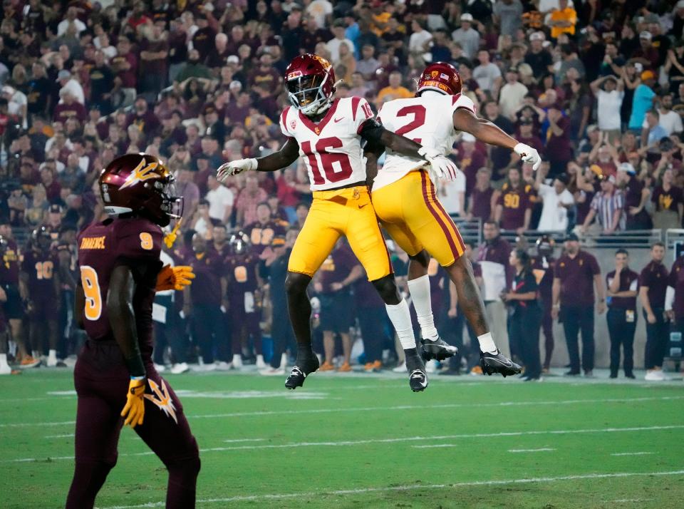 Sep 23, 2023; Tempe, Arizona, USA; USC Trojans wide receiver Brenden Rice (2) celebrates his touchdown catch with wide receiver Tahj Washington (16) against the Arizona State Sun Devils in the first half at Mountain America Stadium. Mandatory Credit: Rob Schumacher-Arizona Republic